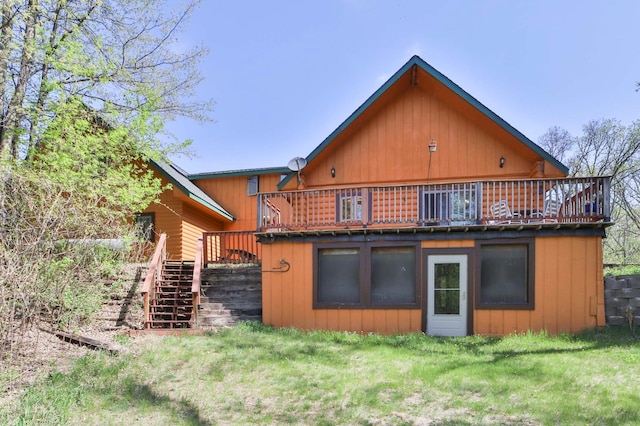 24997 145th Ave, Fort Ripley, MN 56449 - rear view of house with stairway, a yard, and a wooden deck