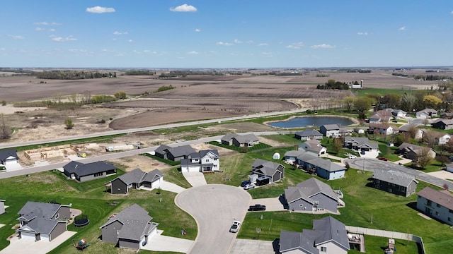 577 Keefe Ct NW, Eyota, MN 55934 - aerial view of property's location with nearby suburban area and a nearby body of water
