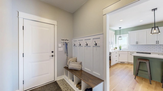 577 Keefe Ct NW, Eyota, MN 55934 - mudroom with light wood finished floors