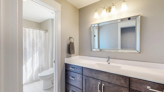 577 Keefe Ct NW, Eyota, MN 55934 - bathroom featuring vanity, toilet, and curtained shower
