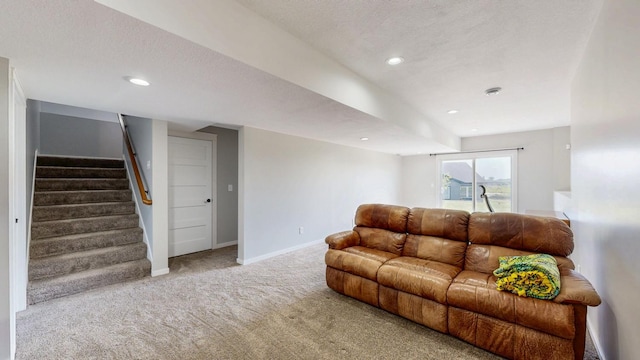 577 Keefe Ct NW, Eyota, MN 55934 - living area featuring carpet, stairway, baseboards, and recessed lighting