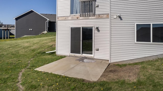 577 Keefe Ct NW, Eyota, MN 55934 - rear view of property featuring a patio area and a yard