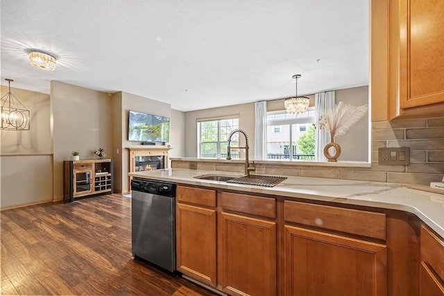11852 Emery Village Dr N Unit 3302, Champlin, MN 55316 - kitchen with dishwasher, a chandelier, a sink, and brown cabinetry