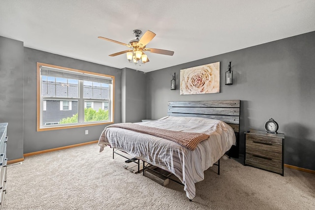 11852 Emery Village Dr N Unit 3302, Champlin, MN 55316 - bedroom with carpet, baseboards, and a ceiling fan