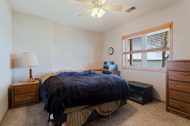46463 Cambridge Dr, Stanchfield, MN 55080 - bedroom featuring carpet floors, baseboards, and ceiling fan