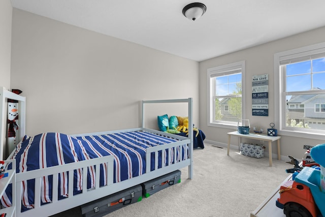 11464 Wagon Wheel Curv, Woodbury, MN 55129 - carpeted bedroom featuring baseboards