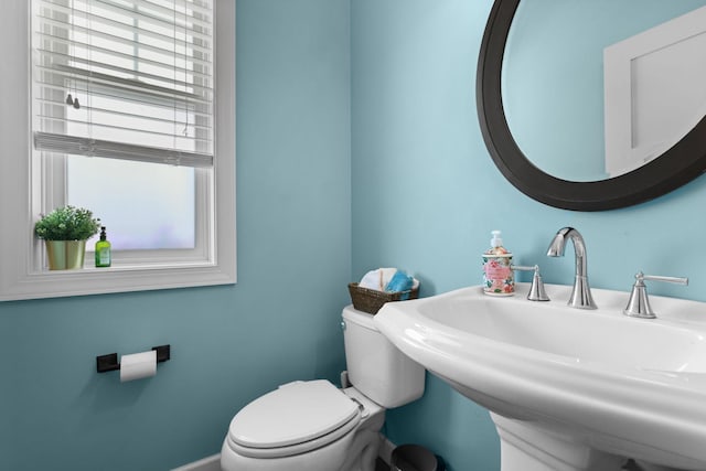 11464 Wagon Wheel Curv, Woodbury, MN 55129 - half bathroom featuring a sink and toilet