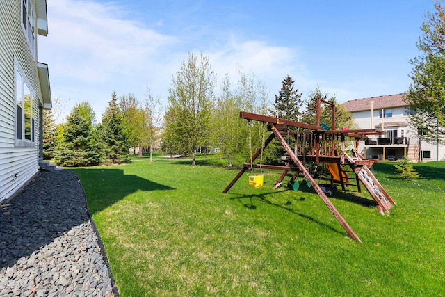 11464 Wagon Wheel Curv, Woodbury, MN 55129 - view of grassy yard featuring a playground