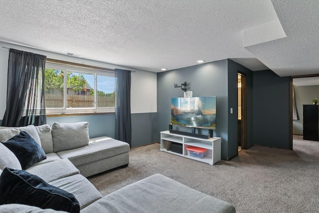 7900 Idaho Cir N, Brooklyn Park, MN 55445 - living area with carpet floors, a textured ceiling, and recessed lighting