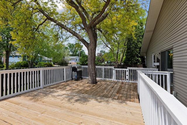 7900 Idaho Cir N, Brooklyn Park, MN 55445 - wooden terrace with area for grilling