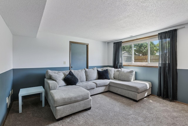 7900 Idaho Cir N, Brooklyn Park, MN 55445 - living room featuring carpet, a textured ceiling, and baseboards
