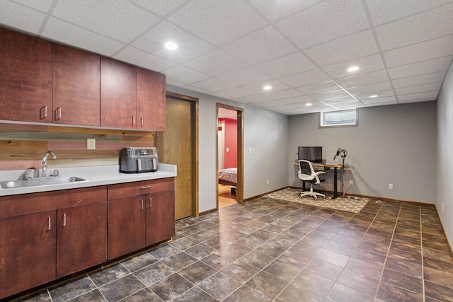 7900 Idaho Cir N, Brooklyn Park, MN 55445 - kitchen with a sink, light countertops, baseboards, recessed lighting, and an office area