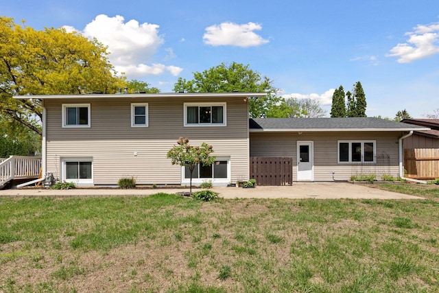 7900 Idaho Cir N, Brooklyn Park, MN 55445 - rear view of house featuring a patio area and a yard