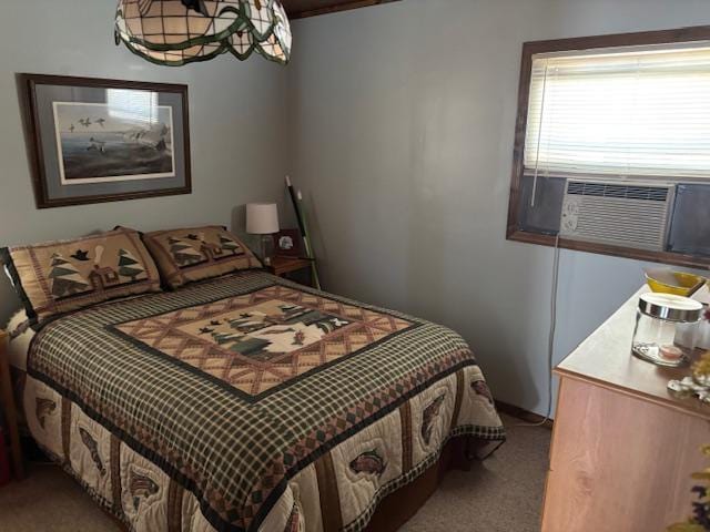 carpeted bedroom with cooling unit