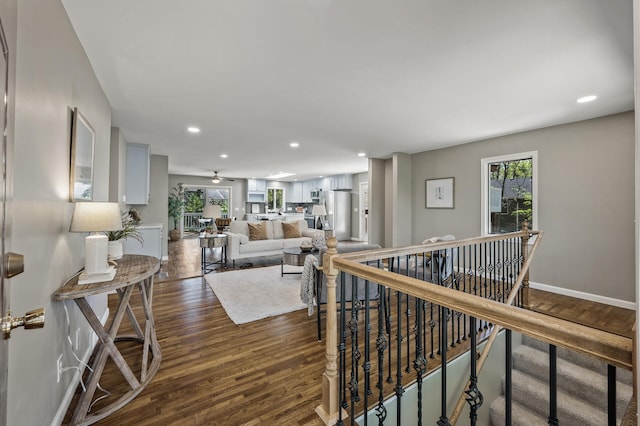 25985 Smithtown Rd, Shorewood, MN 55331 - living area with dark wood-style flooring, recessed lighting, baseboards, and a ceiling fan