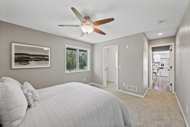 25985 Smithtown Rd, Shorewood, MN 55331 - bedroom with baseboards, carpet flooring, and a ceiling fan