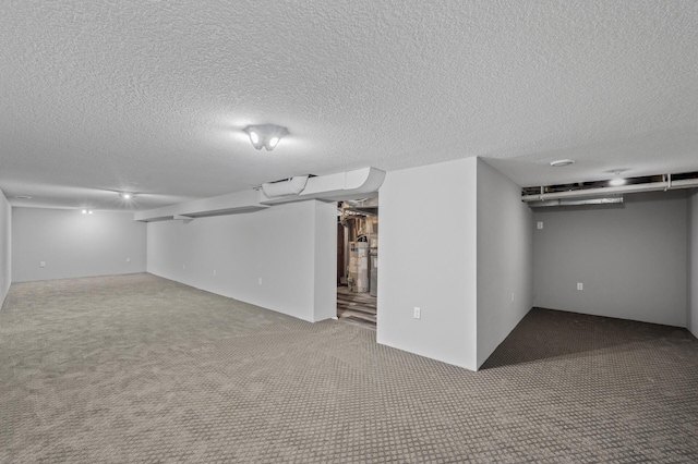 25985 Smithtown Rd, Shorewood, MN 55331 - finished basement featuring water heater, carpet flooring, and a textured ceiling