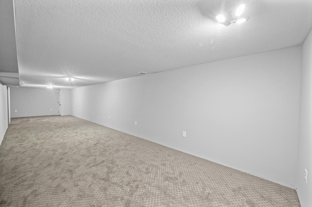 25985 Smithtown Rd, Shorewood, MN 55331 - finished basement featuring carpet floors and a textured ceiling