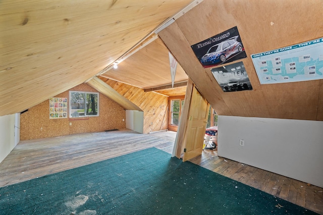 25985 Smithtown Rd, Shorewood, MN 55331 - bonus room with wood-type flooring, wood walls, vaulted ceiling, and wooden ceiling