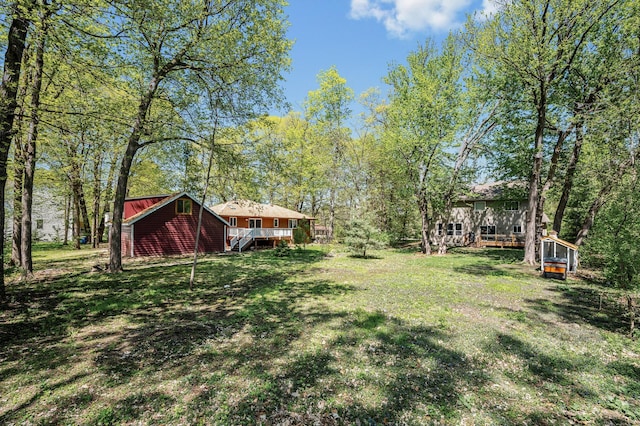 25985 Smithtown Rd, Shorewood, MN 55331 - view of green lawn featuring a deck