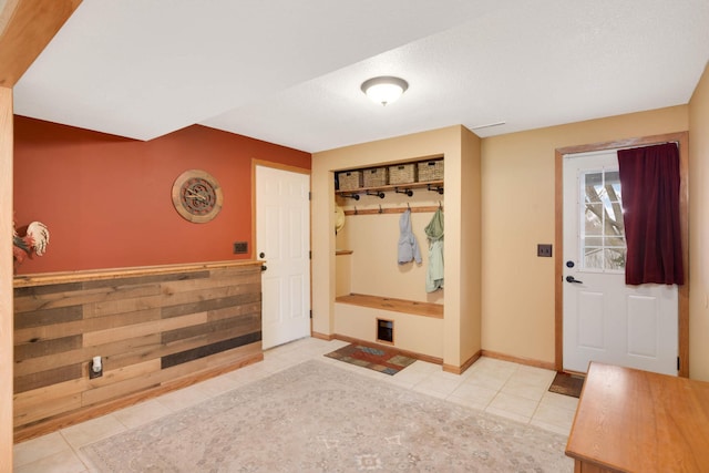 mudroom featuring tile patterned floors