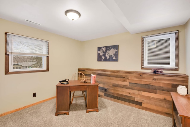 office area featuring carpet, visible vents, and baseboards