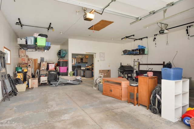 garage featuring a garage door opener