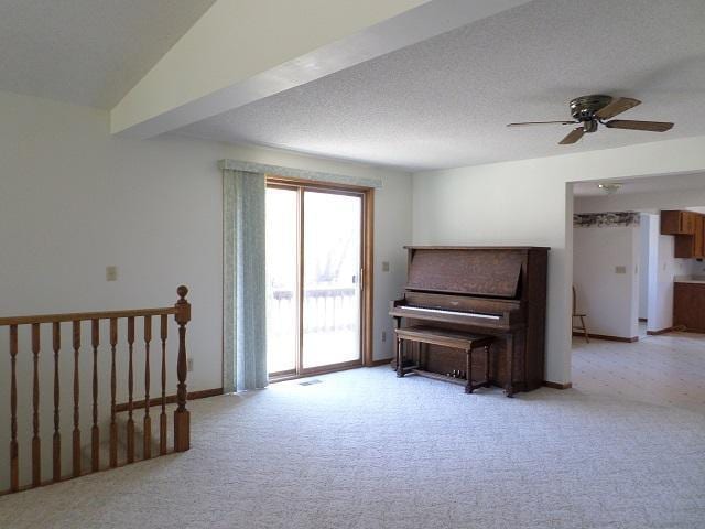 202 Buse Ave NE, Red Lake Falls, MN 56750 - sitting room with baseboards, light carpet, and ceiling fan