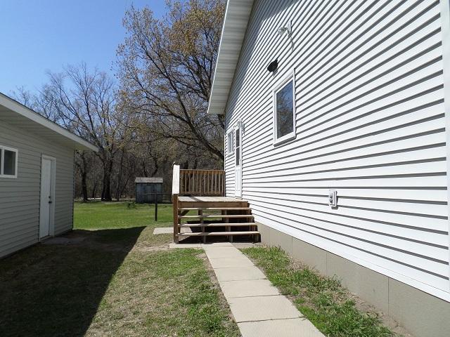 202 Buse Ave NE, Red Lake Falls, MN 56750 - view of yard with a deck