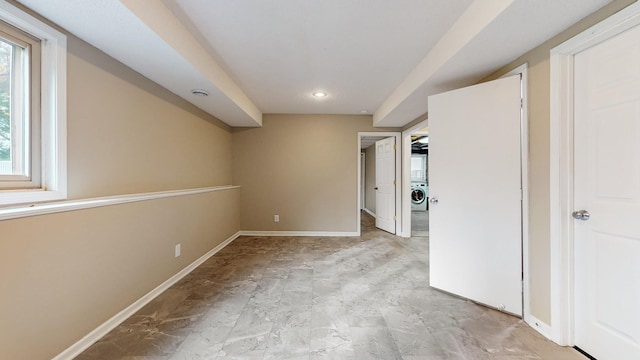 interior space featuring washer / dryer, baseboards, and recessed lighting
