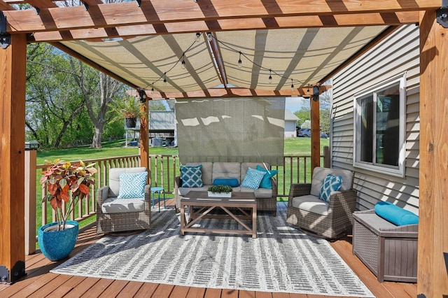 wooden terrace featuring an outdoor living space, a pergola, and a yard