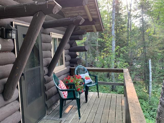 deck with a view of trees