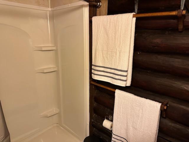bathroom featuring a shower