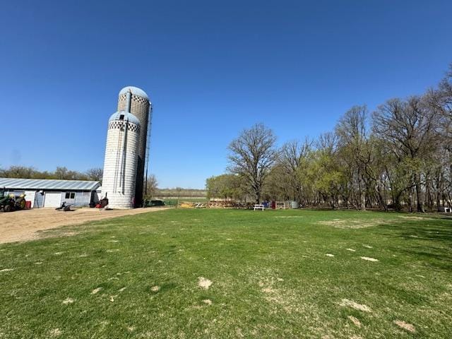 view of community featuring a yard