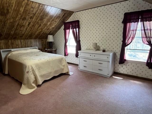bedroom with vaulted ceiling, carpet, wood ceiling, and wallpapered walls