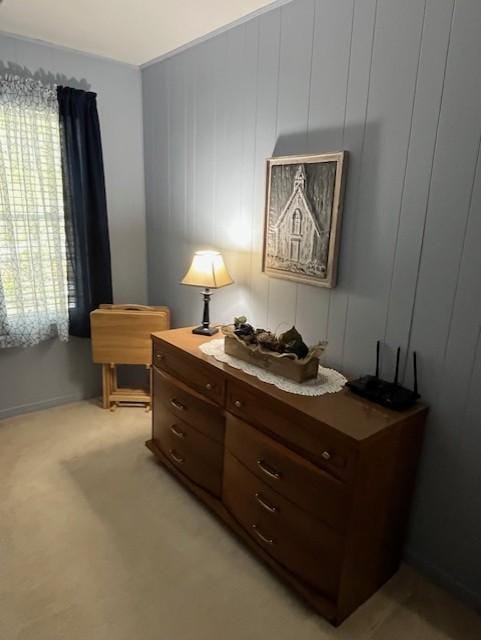 sitting room with light colored carpet