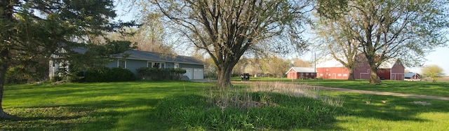 view of yard with a garage