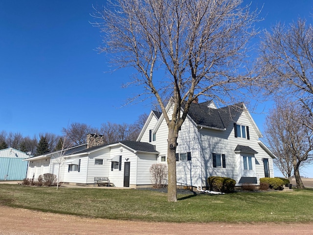 37229 790th Ave, Rosendale Twp, MN 56060 - view of side of property with a chimney and a yard