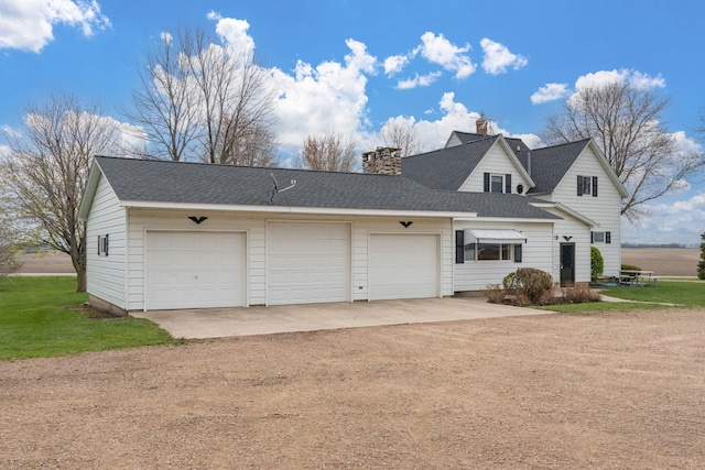 37229 790th Ave, Rosendale Twp, MN 56060 - view of side of property with roof with shingles, dirt driveway, an attached garage, and a chimney