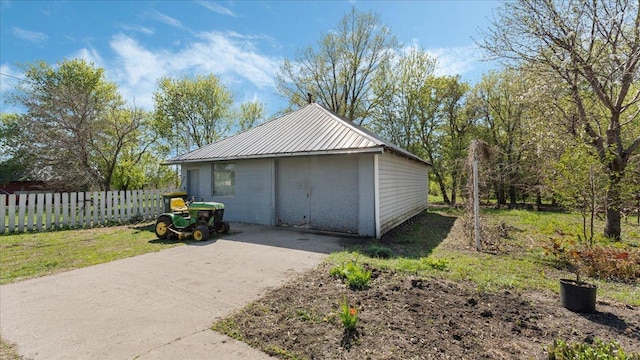 garage featuring fence