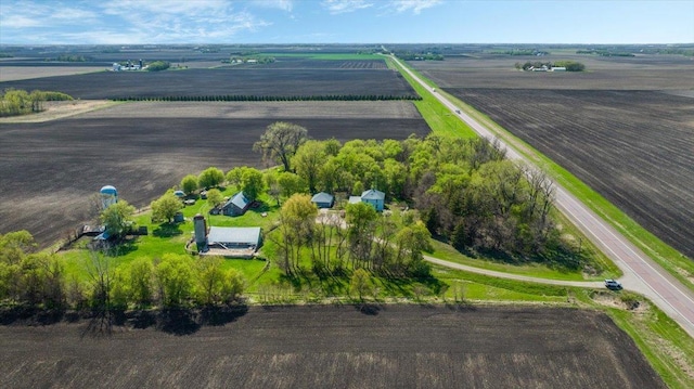 aerial view of sparsely populated area featuring farmland