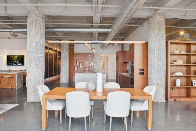 700 2nd St Unit W31, Minneapolis, MN 55401 - dining space featuring concrete flooring