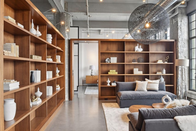 700 2nd St Unit W31, Minneapolis, MN 55401 - sitting room featuring finished concrete flooring and a towering ceiling