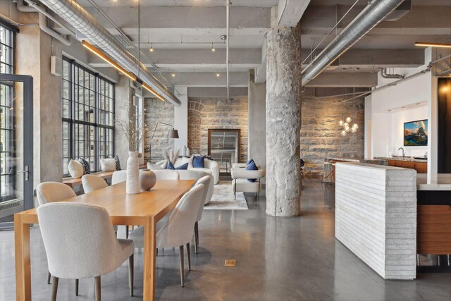 700 2nd St Unit W31, Minneapolis, MN 55401 - dining space with finished concrete flooring and a towering ceiling