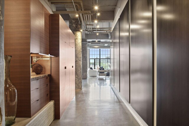 700 2nd St Unit W31, Minneapolis, MN 55401 - hall featuring finished concrete floors and elevator