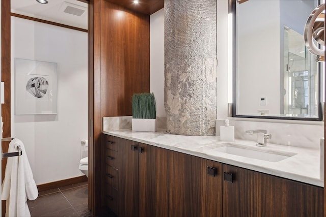 700 2nd St Unit W31, Minneapolis, MN 55401 - full bathroom featuring tile patterned floors, toilet, and vanity