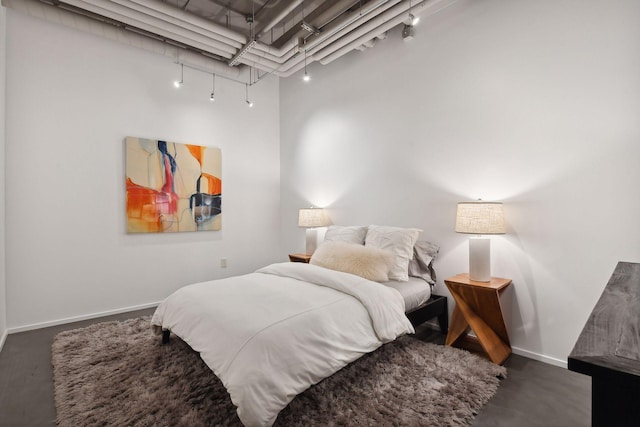 700 2nd St Unit W31, Minneapolis, MN 55401 - bedroom with track lighting and baseboards