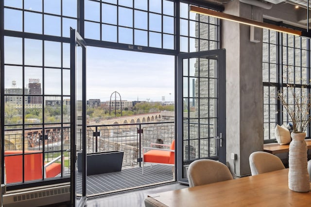 700 2nd St Unit W31, Minneapolis, MN 55401 - doorway with a high ceiling, a view of city, and a wealth of natural light