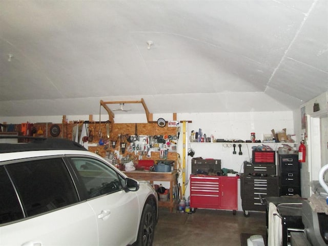 garage with a workshop area