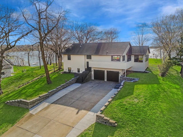 10823 Big Chip Rd NW, Brandon Twp, MN 56315 - view of front of home with concrete driveway, a garage, a front lawn, a chimney, and roof with shingles